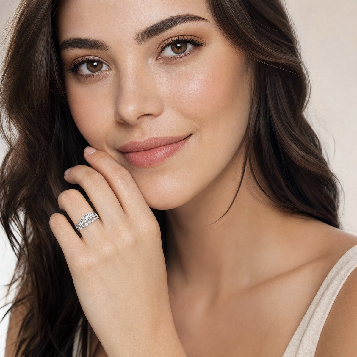 woman wearing Sterling Silver 3-Stone CZ Engagement Ring & Wedding Band Set