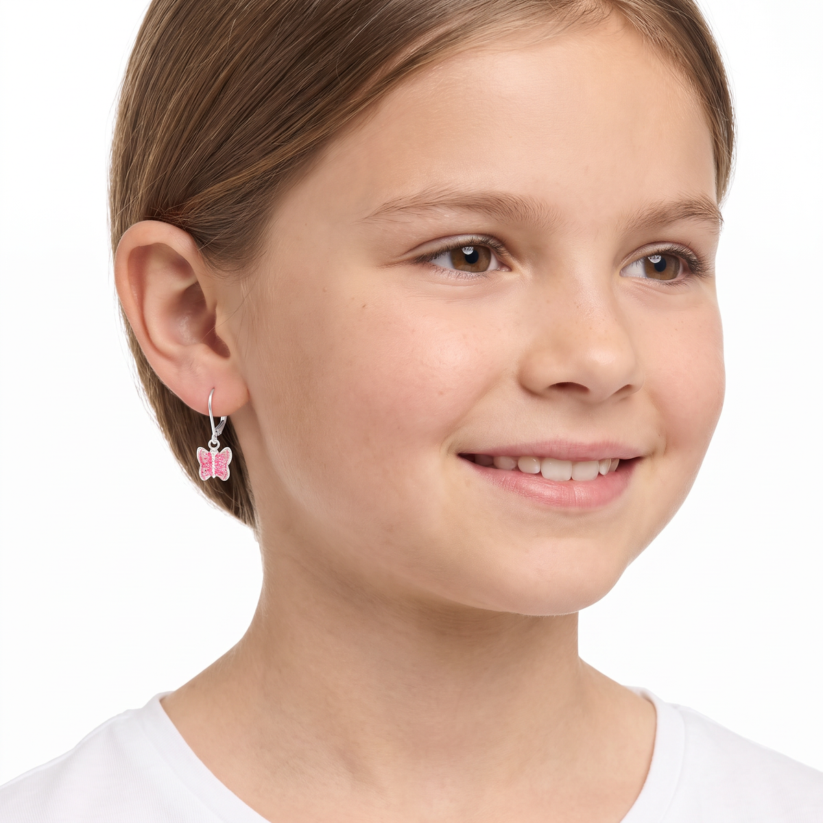 Girls sterling silver sparkly butterfly leverback earrings on 10 year old girl