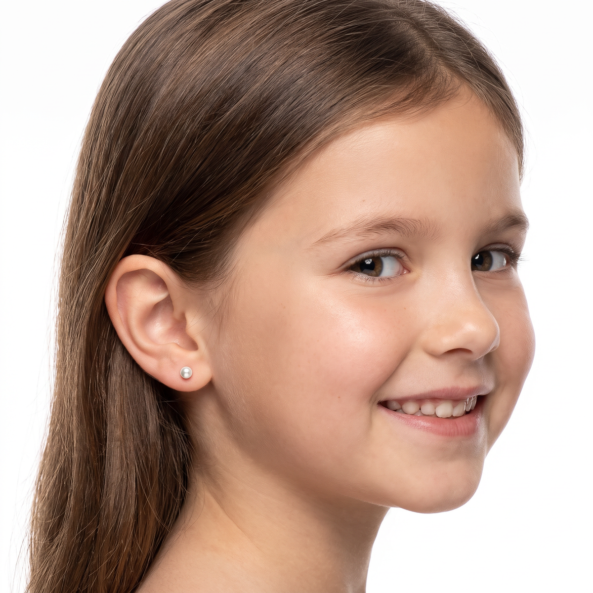 Close-up of petite 3mm white pearl stud earrings for children