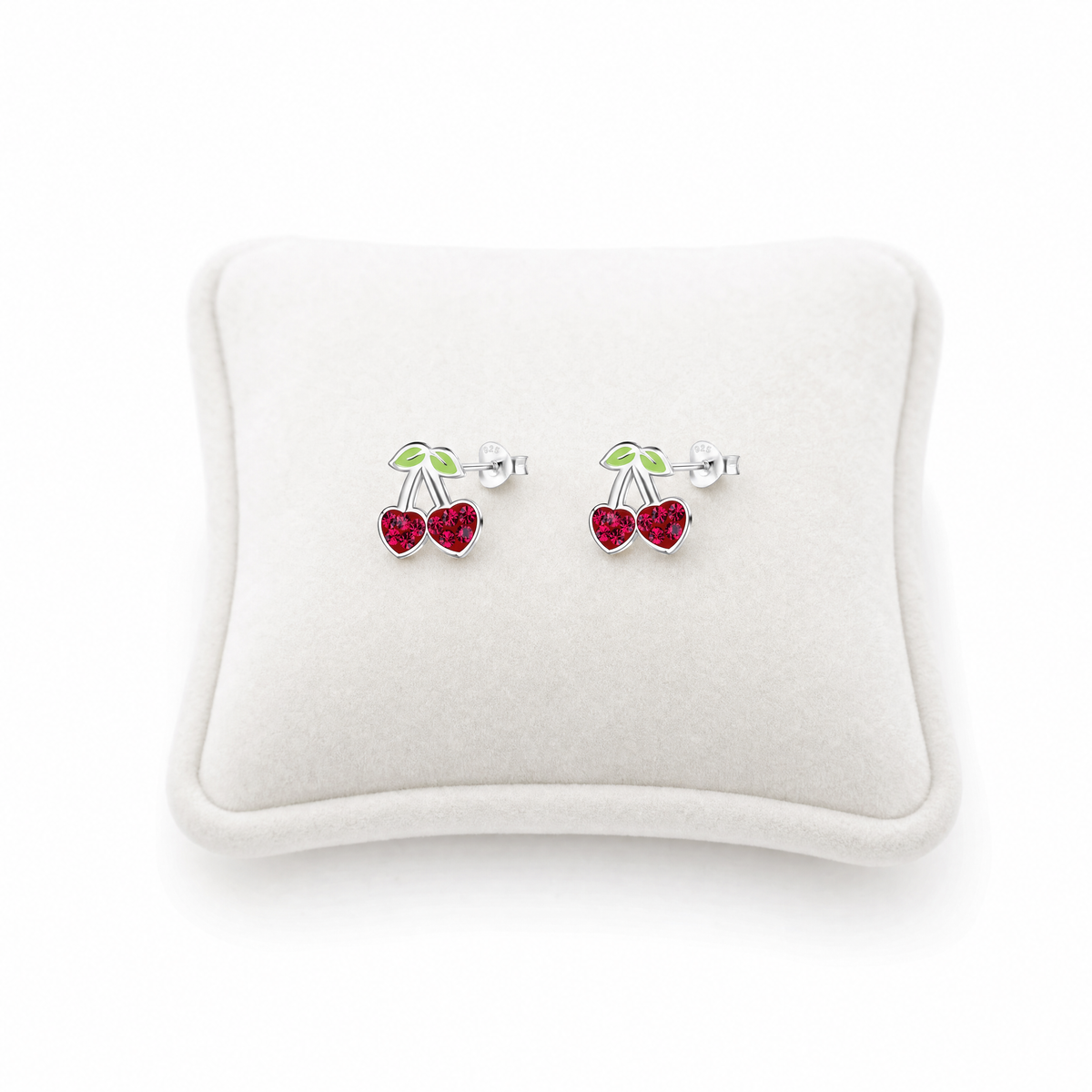 A pair of silver stud earrings shaped like cherries with red crystal bodies and green crystal leaves.