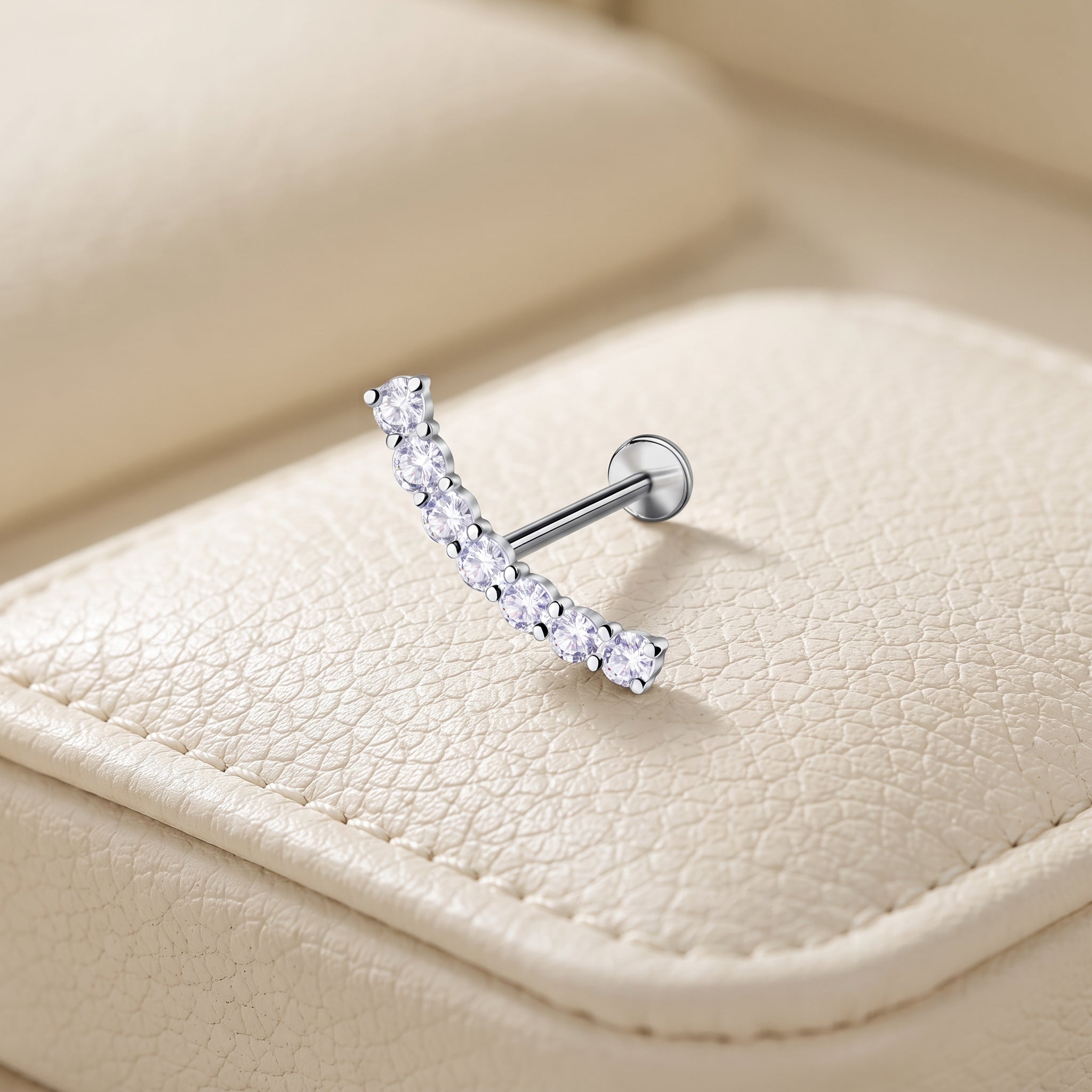 Sterling silver curved titanium labret stud on cushion