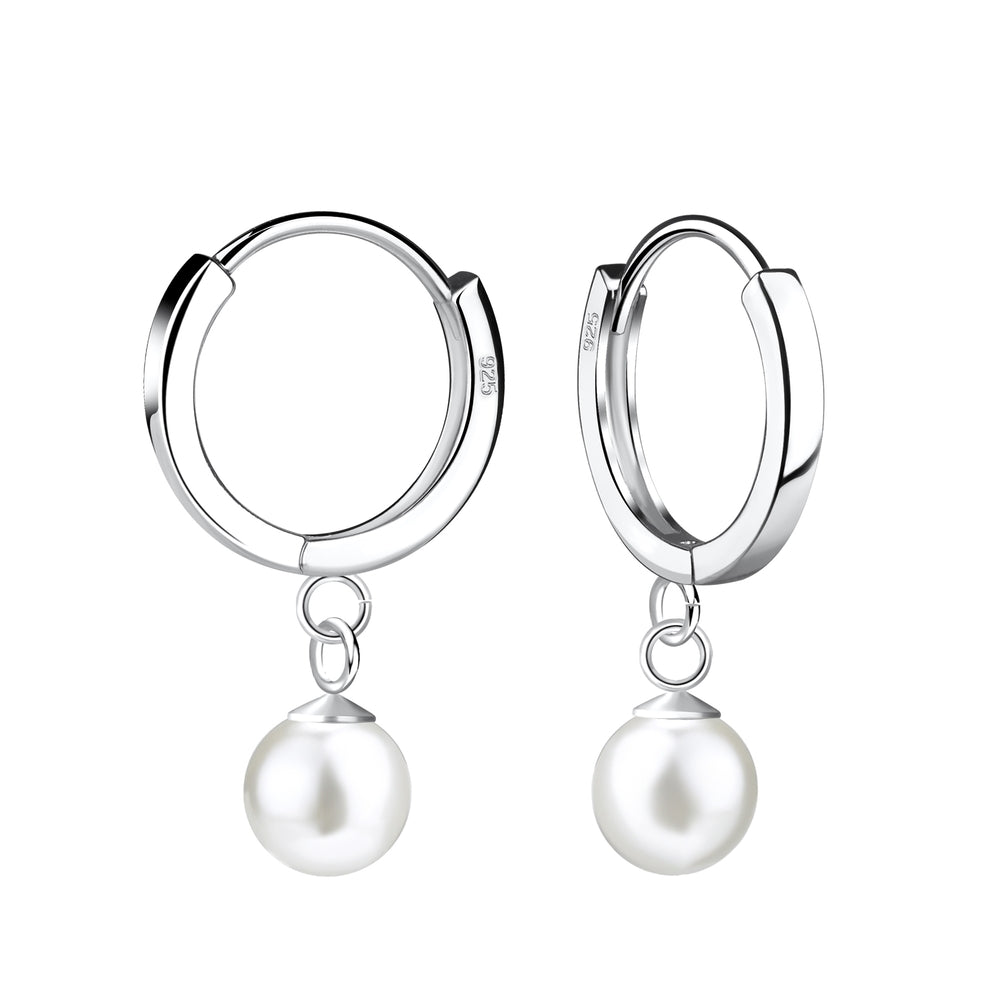 Silver hoop earrings with pearl drops on a white background