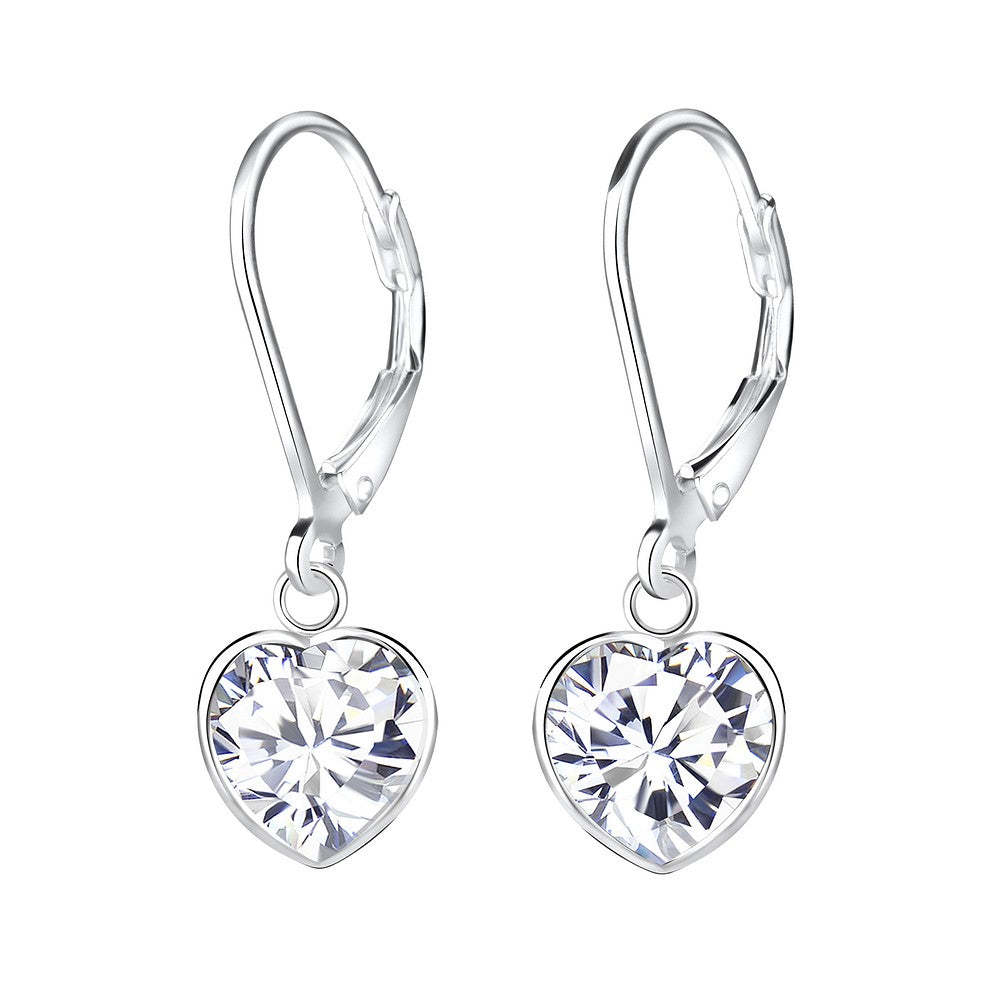 A pair of silver leverback earrings with heart-shaped clear gemstones, shown on a plain white background.