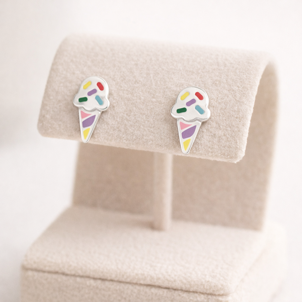 Melchior Jewellery silver colourful ice cream earrings with white, yellow, purple, red, green and blue details on soft beige stand