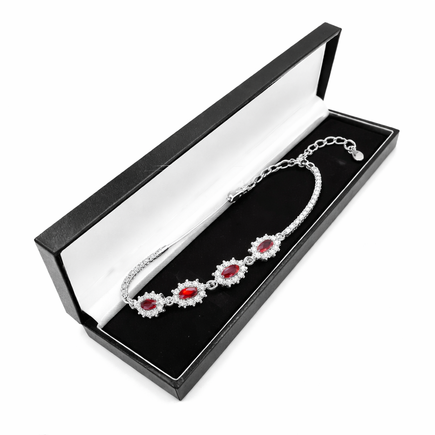 Sterling Silver Ruby Cluster Link Bracelet with vibrant red oval rubies and intricate silver detailing in black gift box