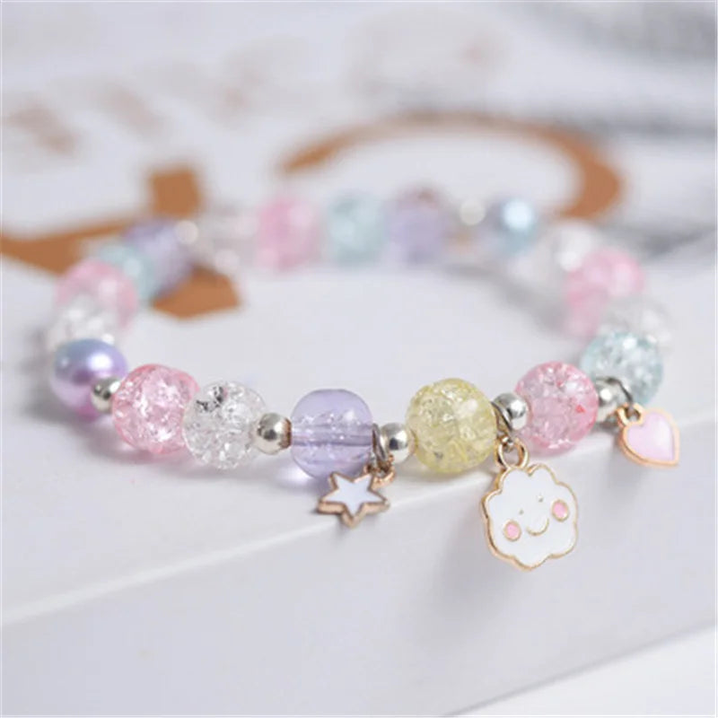 Melchior Jewellery cloud charm bracelet for kids with pastel coloured beads and cute cloud and star charms