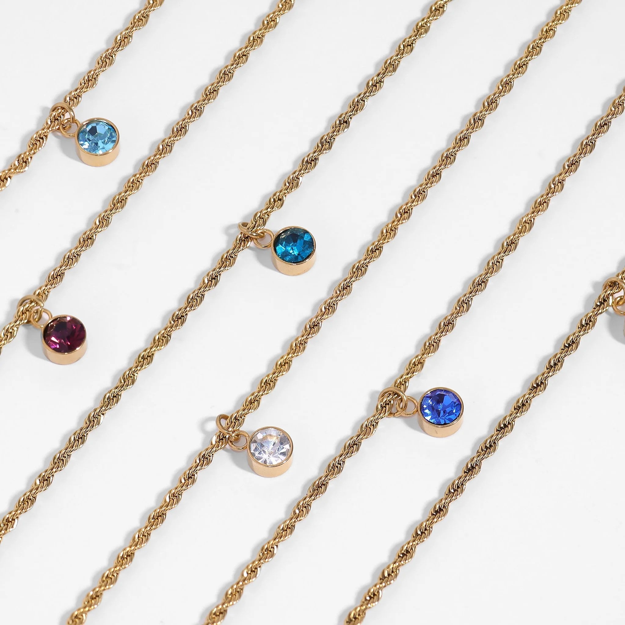 Melchior Jewellery gold stainless steel birthstone charm bracelets with colourful round stones