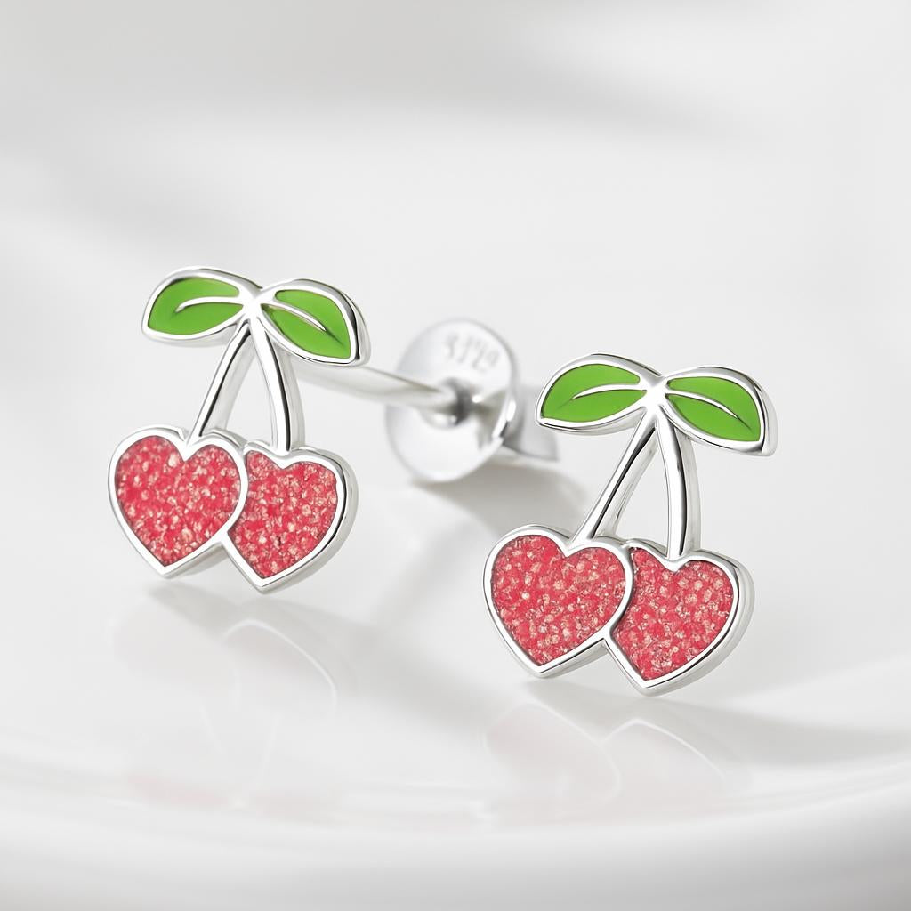 Melchior Jewellery girls silver cherry earrings with red heart-shaped cherries and green leaves