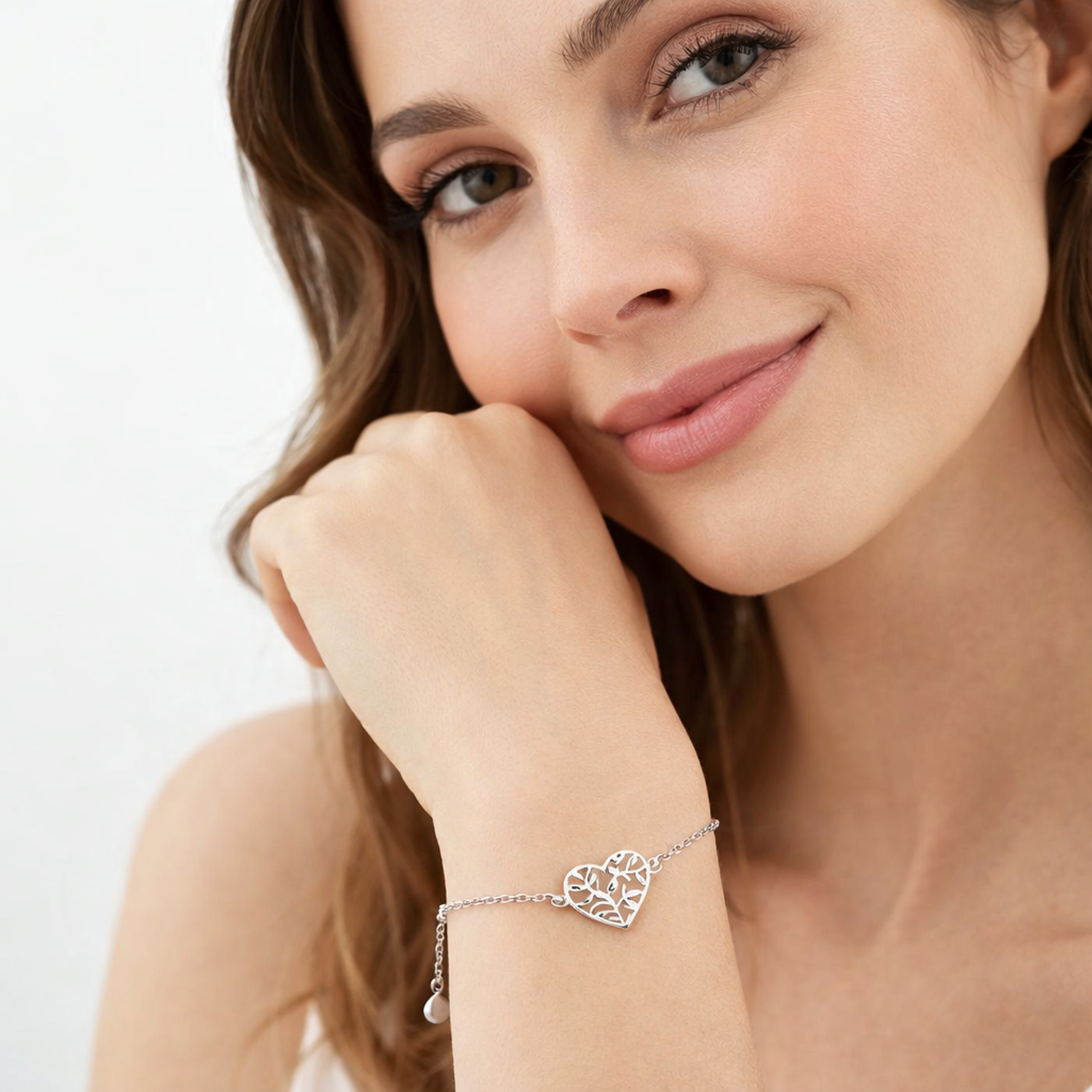 Sentiell woman's olive leaf bracelet sterling silver with heart design on wrist