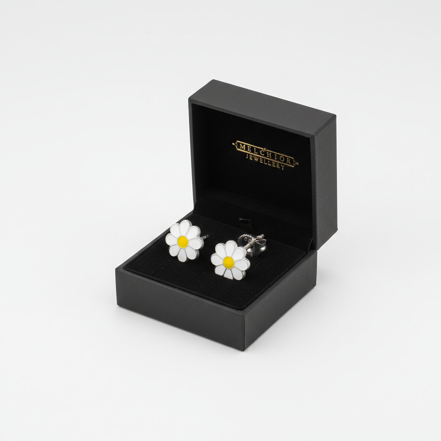 sterling silver kids screw back flower earrings with white enamel petals and yellow centre in black box