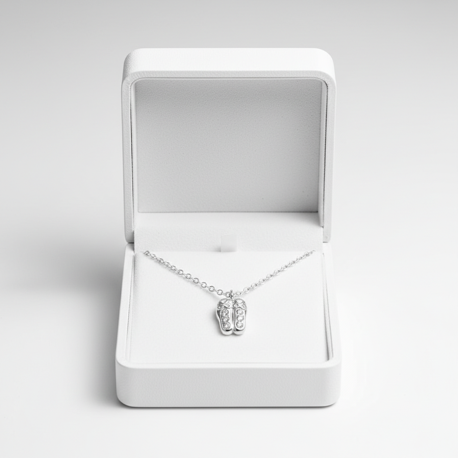 Melchior Jewellery ballet shoes charm necklace for children displayed in white gift box