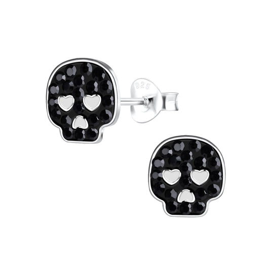 Melchior Jewellery childrens black skull stud earrings with heart eye cutouts and silver backing