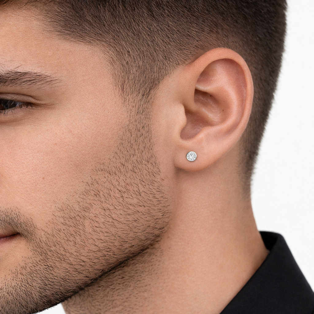 Man wearing a brilliant cut single stud earring for men by Melchior Jewellery