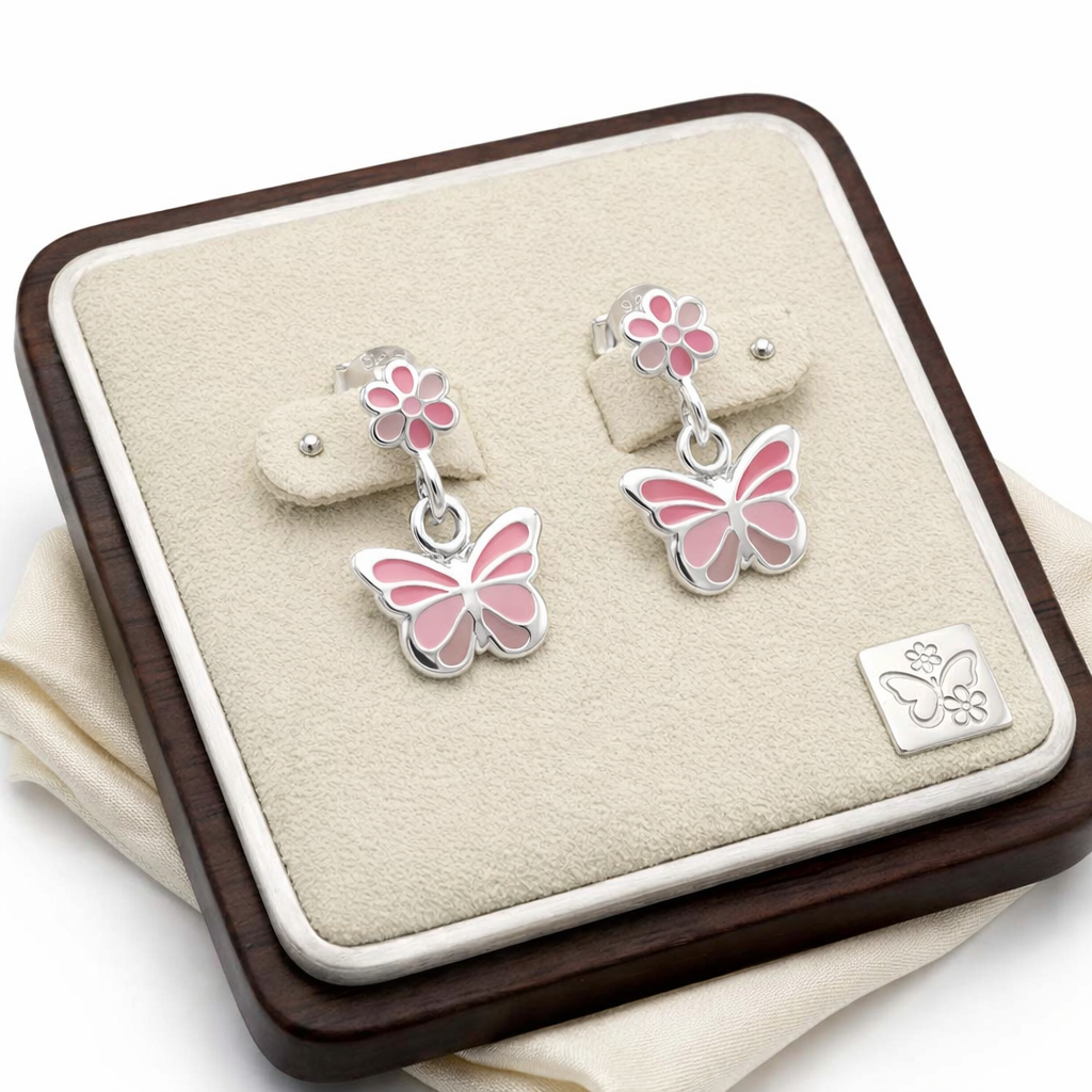 Melchior Jewellery butterfly drop earrings for girls with pink enamel butterflies and flowers on silver studs