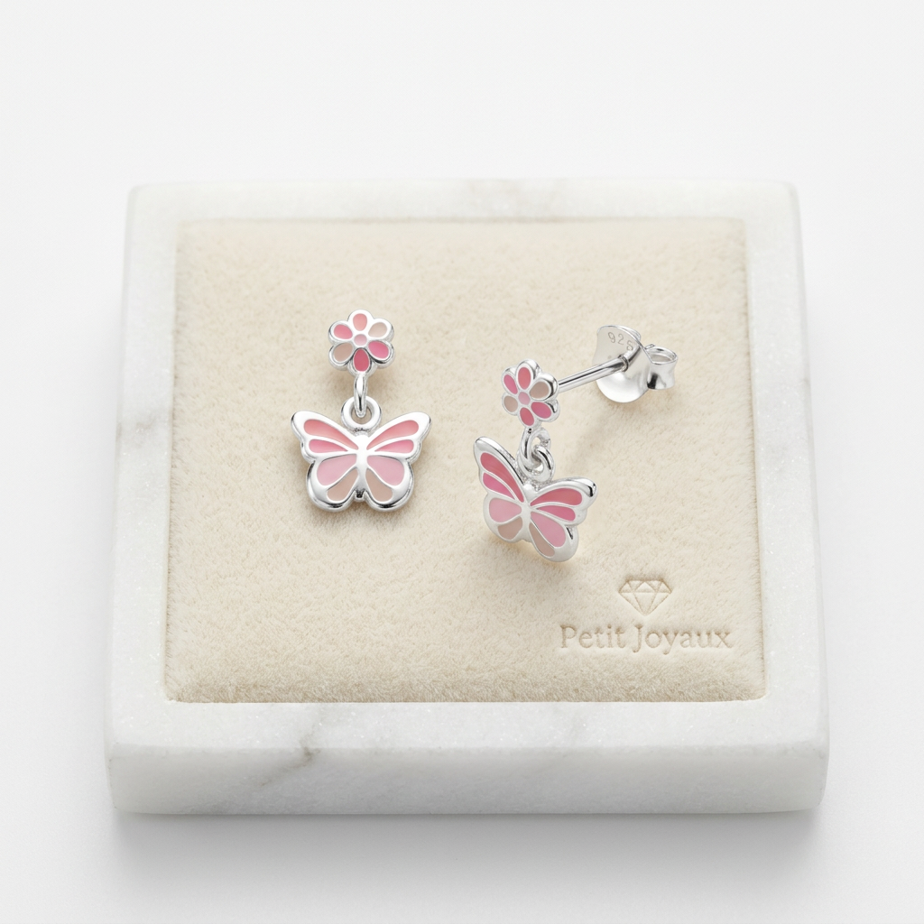 Melchior Jewellery pink and silver butterfly drop earrings for girls with flower studs on cream display