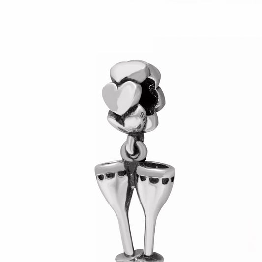 Melchior Jewellery charm featuring champagne glasses bead for bracelet with heart-shaped details
