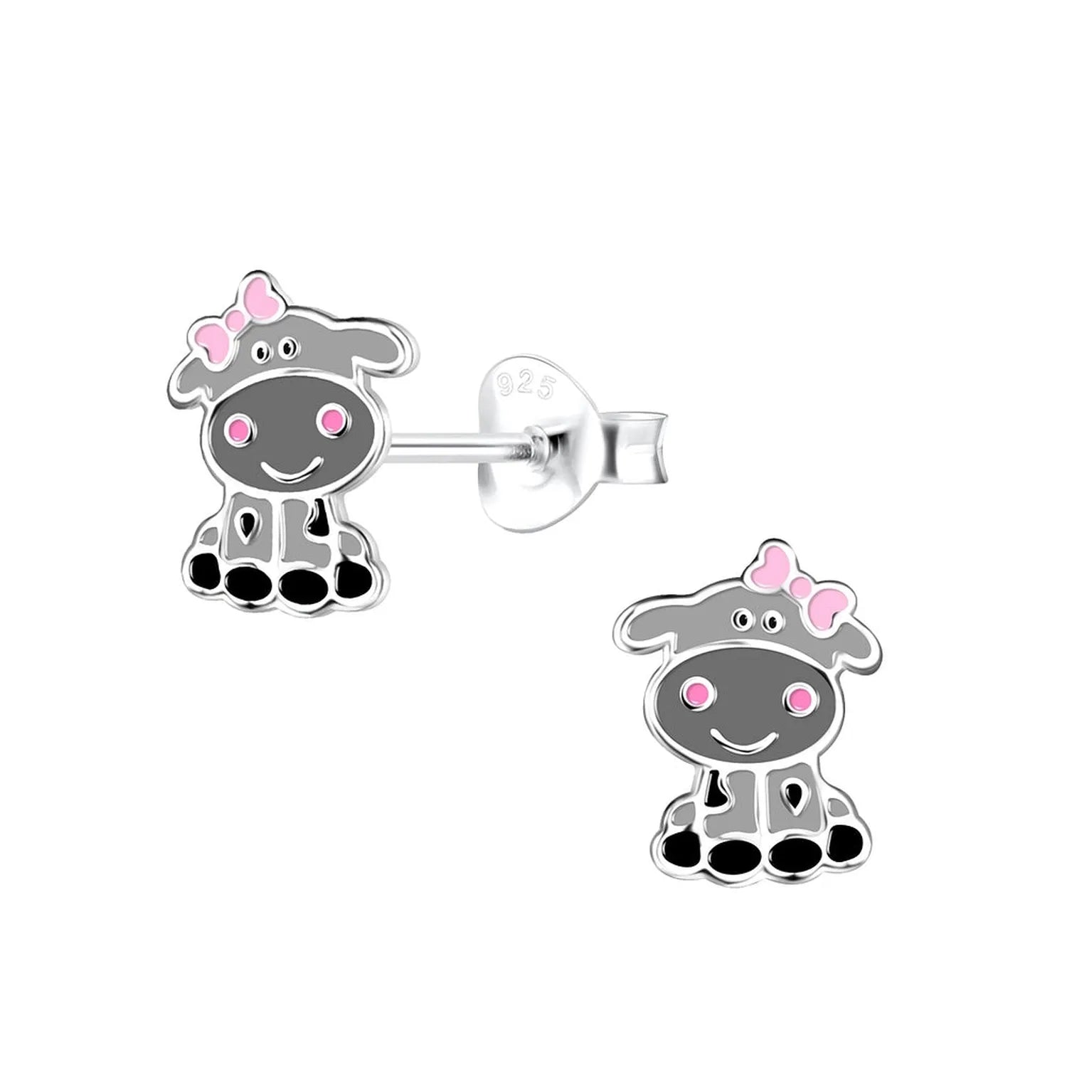Melchior Jewellery Childrens Sterling Silver Cow Earrings featuring grey cows with pink bows and nose details