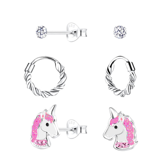 Children's sterling silver earrings set by Melchior Jewellery including unicorn studs, twisted hoops, and clear stone studs
