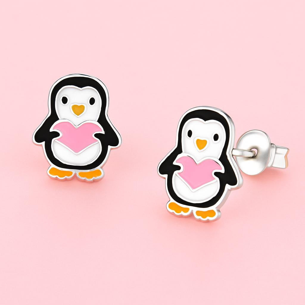 Cute penguin stud earrings for kids by Melchior Jewellery featuring black and white penguins holding pink hearts