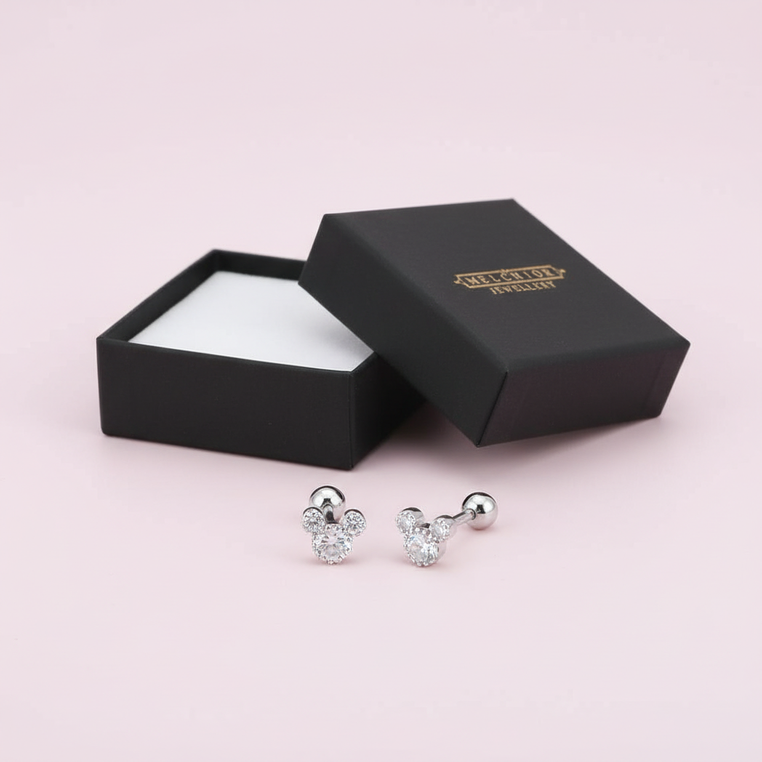 CZ mouse stud earrings for girls by In Season Jewellery displayed with black jewellery box