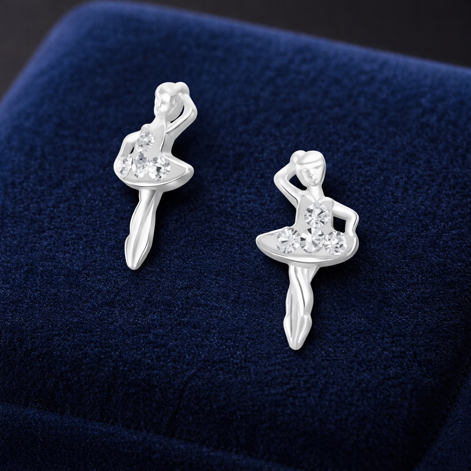 Melchior Jewellery girls ballet dancer earrings in silver with crystal detailing on blue velvet
