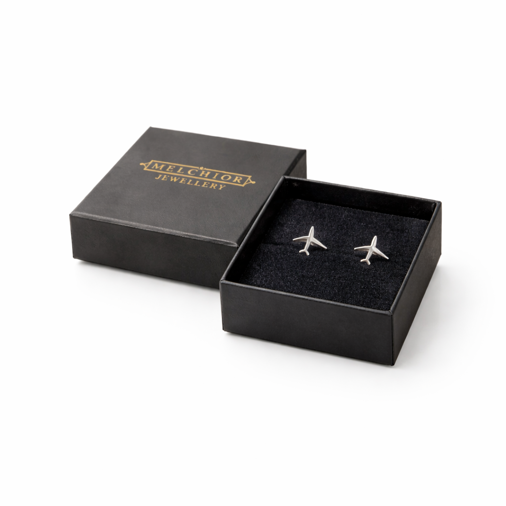 Melchior Jewellery hypoallergenic kids earrings shaped like airplanes in black gift box