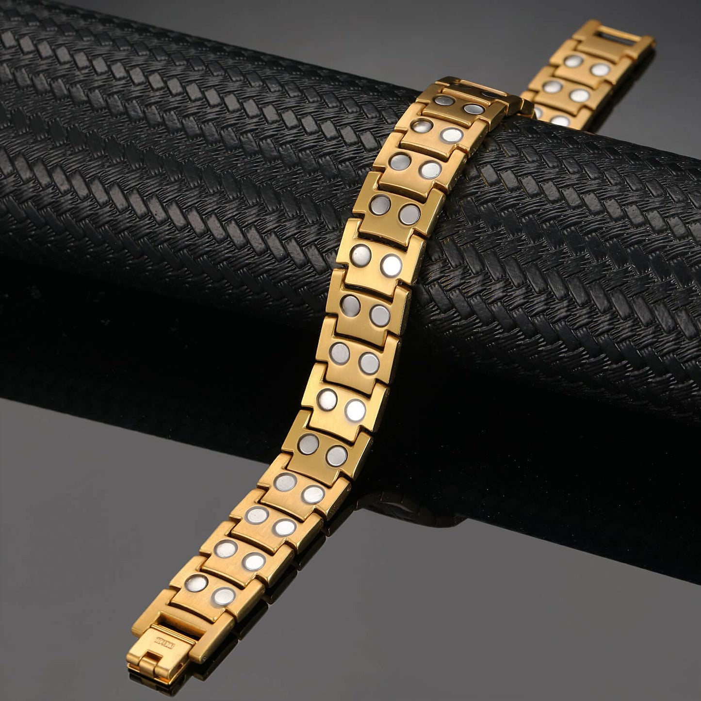 Melchior Jewellery gold titanium magnetic therapy bracelet with linked gold plates and circular magnet inserts