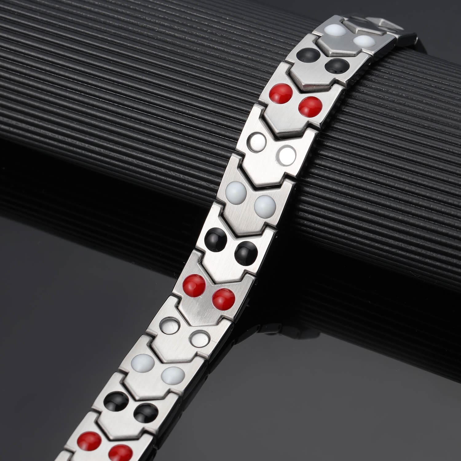 Melchior Jewellery mens gold and silver magnetic therapy bracelet stainless steel links with red black and white therapy nodes