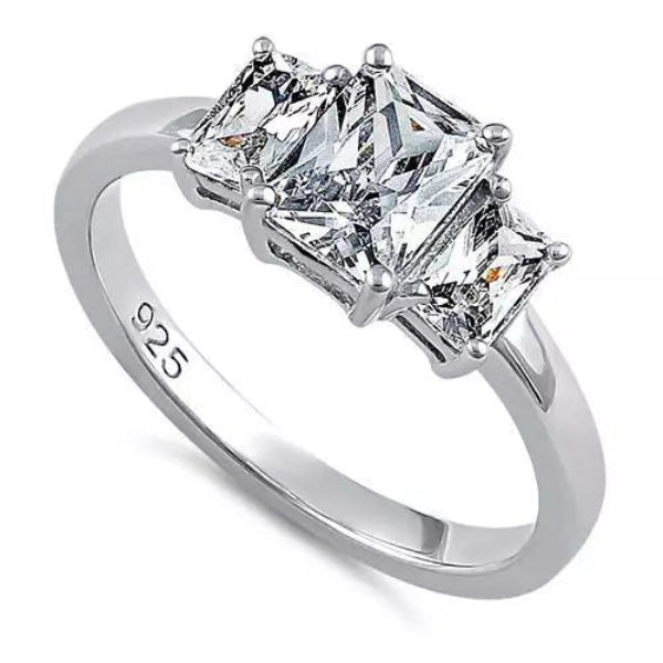 Melchior Jewellery sterling silver triple stone engagement ring with three princess cut stones on polished band