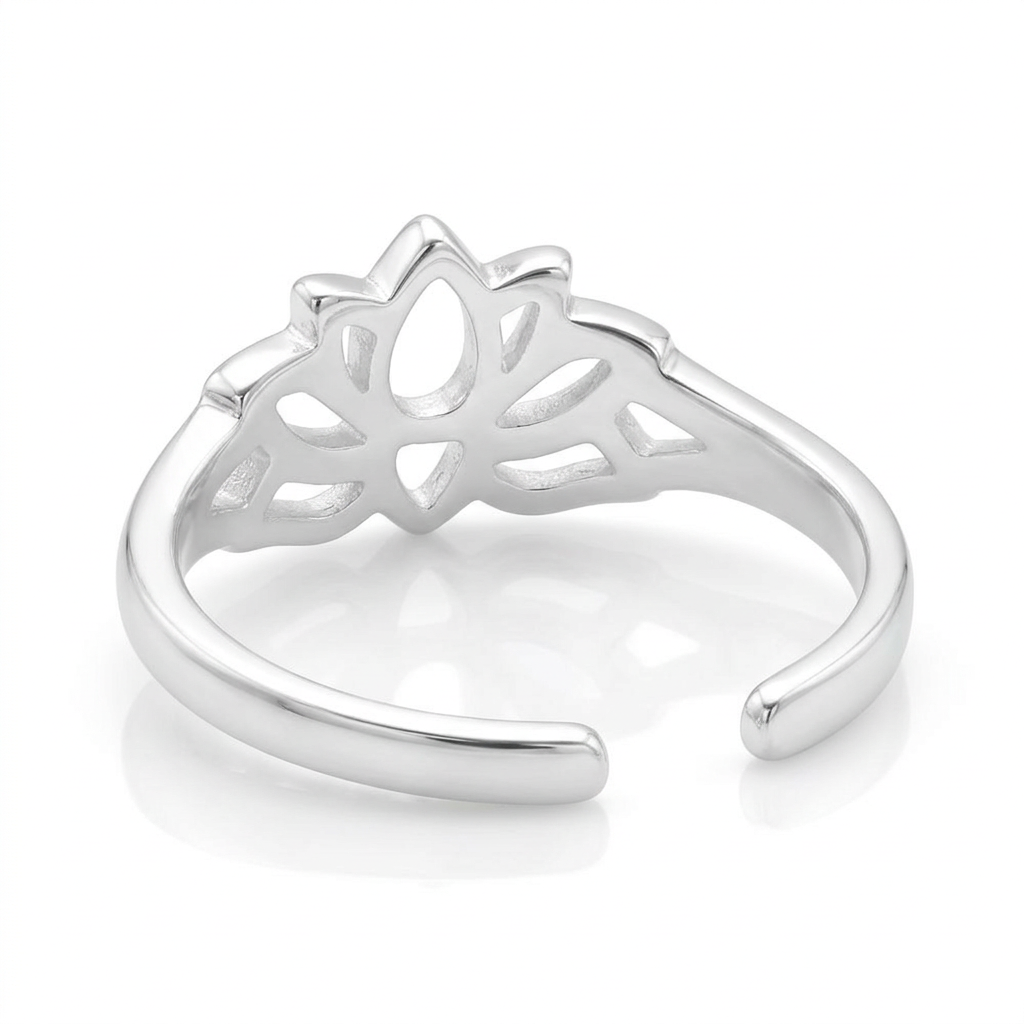 Silver lotus toe ring by Melchior Jewellery with open adjustable band and intricate cutout flower design