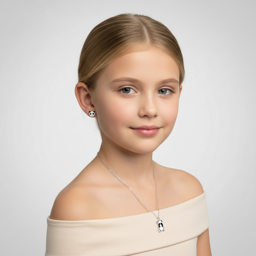Melchior Jewellery panda stud earrings and necklace gift set worn by a young girl with a neutral background