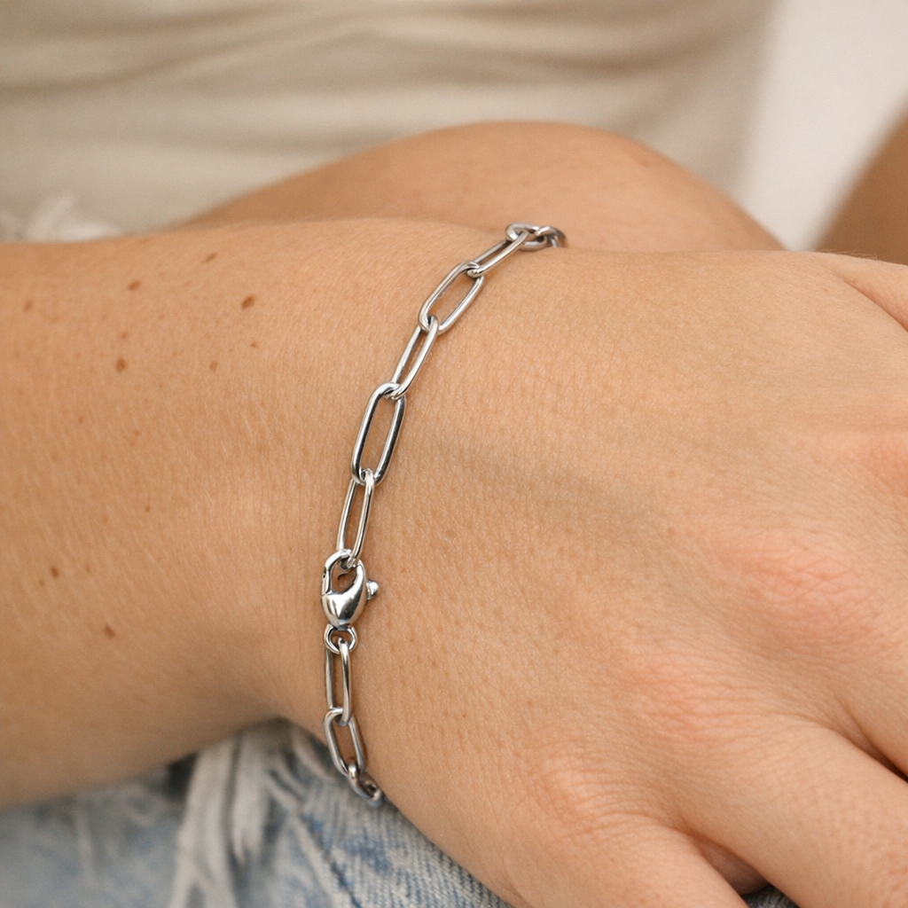 Silver Paperclip Chain Bracelet by Melchior Jewellery on wrist with elongated links and lobster clasp