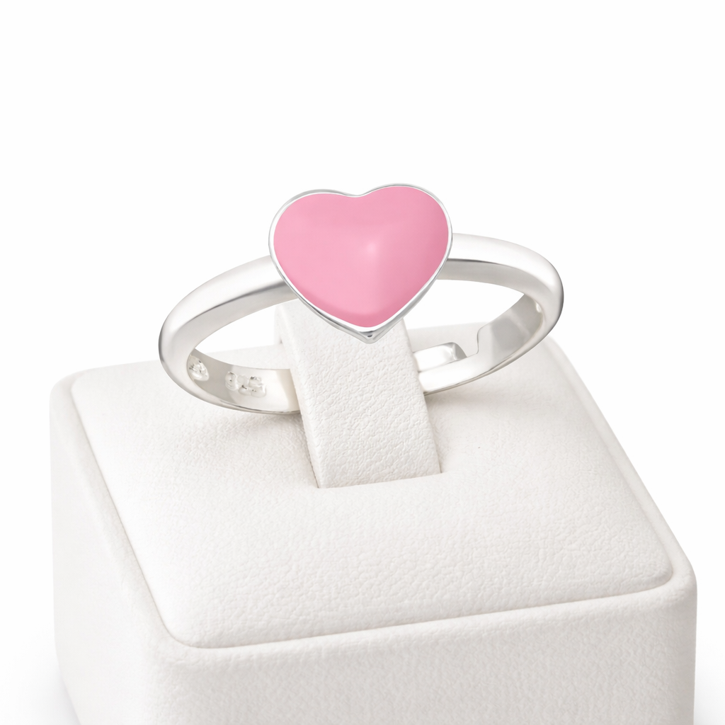 Silver childrens ring with a glossy pink heart ring for girls on white display stand