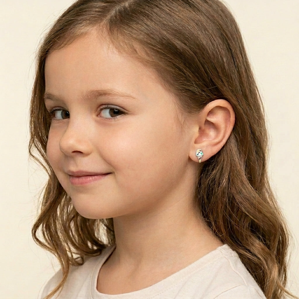 Girl wearing Silver Colourful Ice Cream Earrings by Melchior Jewellery with blue, pink, and white enamel details