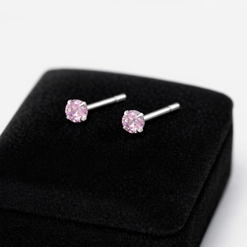Silver pink round earrings sterling with delicate pink gemstones set in sterling silver studs on black cushion
