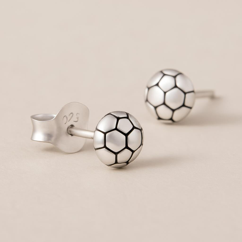 Melchior Jewellery Small Football Stud Earrings Earrings For Kids in silver with black detailing