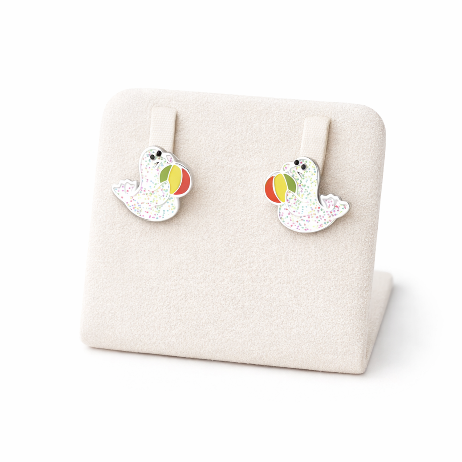 Melchior Jewellery sparkly seal stud earrings for kids displayed on beige earring stand