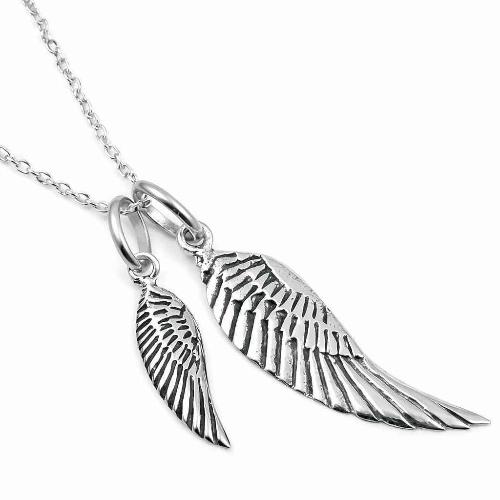 Melchior Jewellery sterling silver angel wings necklace with detailed wing pendants on delicate chain
