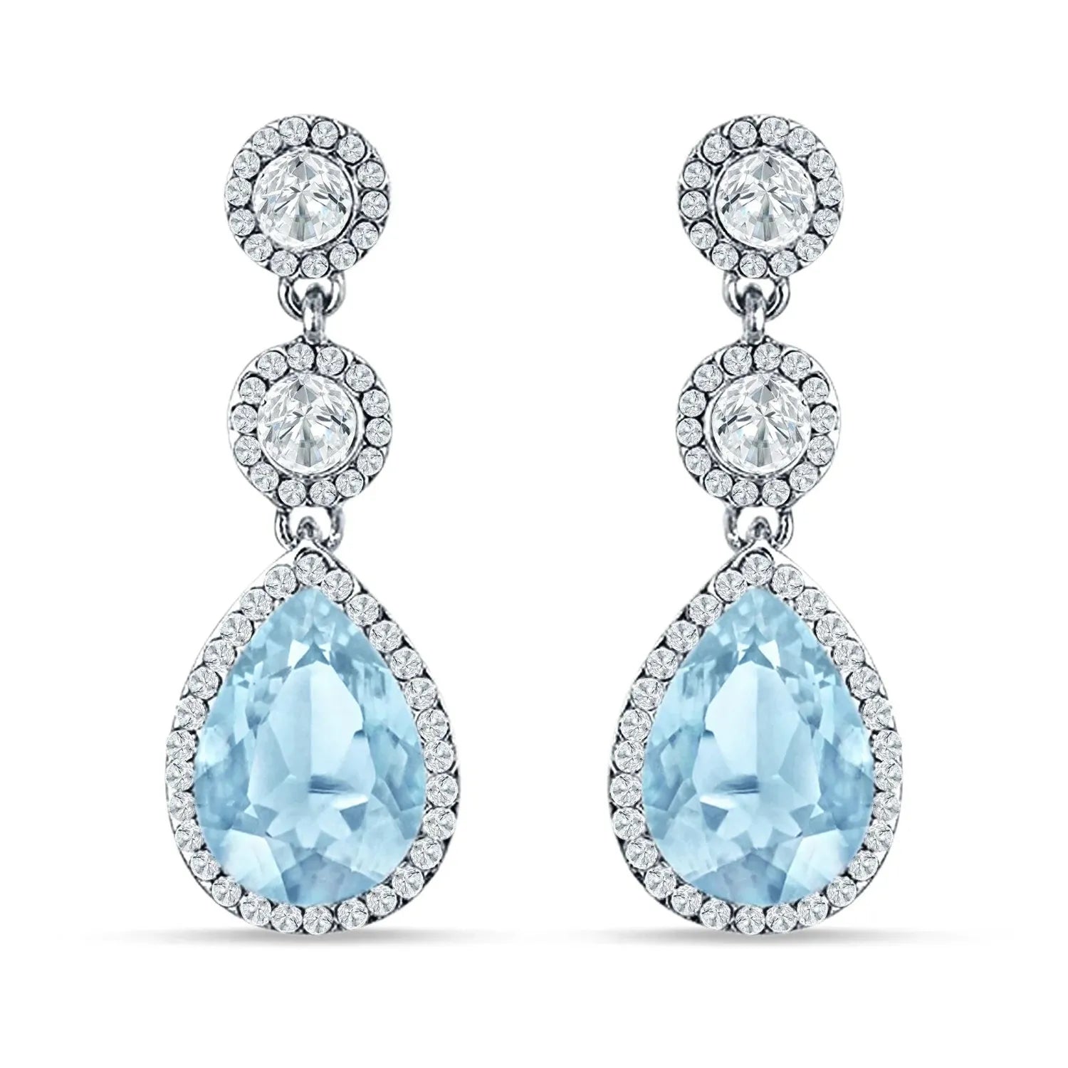 Sterling Silver Aquamarine Halo Drop Earrings by Melchior Jewellery featuring pear-shaped blue stones with crystal halo