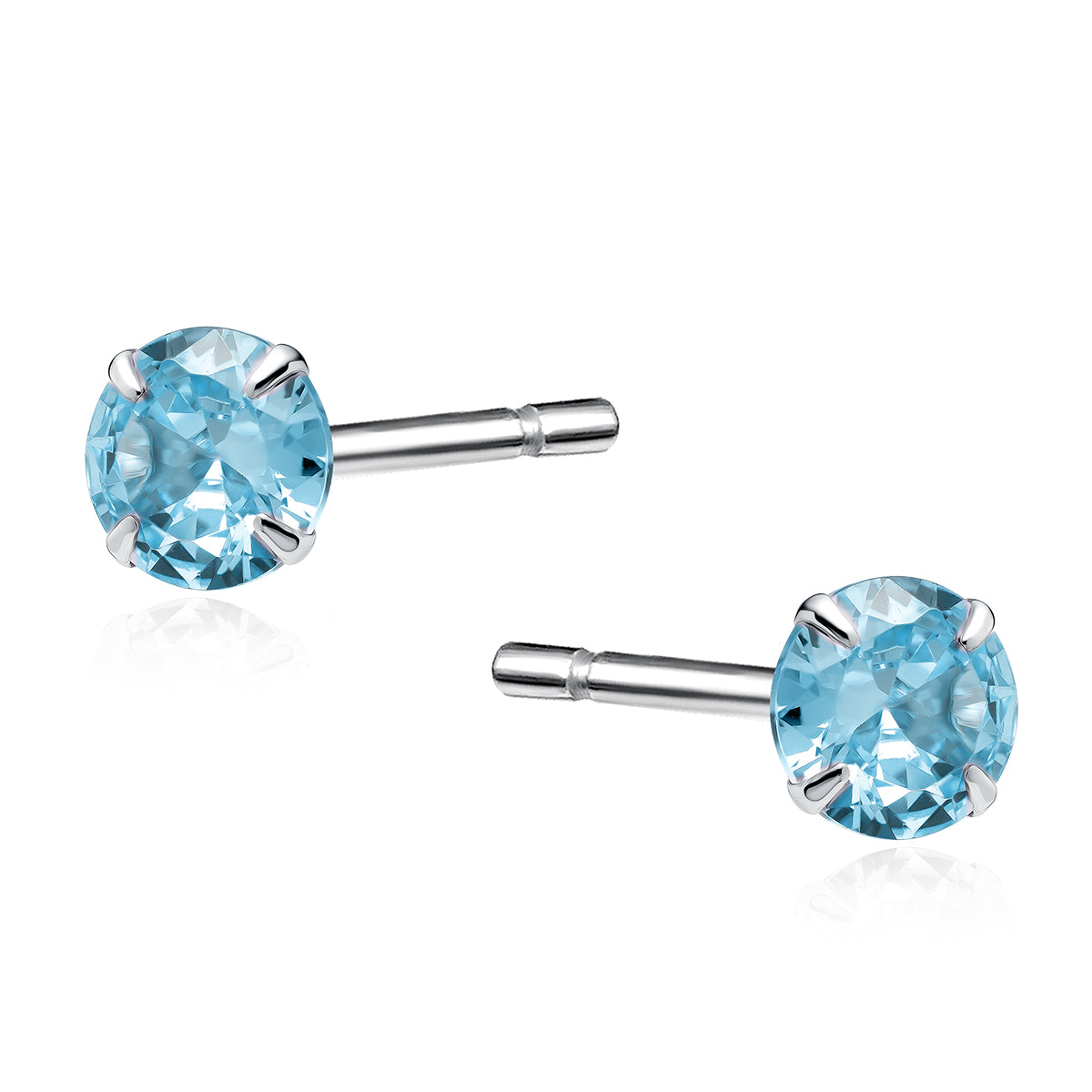 Melchior Jewellery sterling silver aquamarine stud earrings with light blue round gemstones and polished silver claws