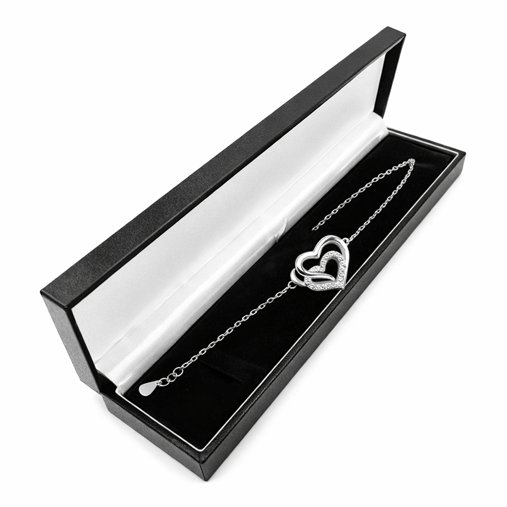 Sentiell sterling silver double heart bracelet displayed in an elegant black and white gift box