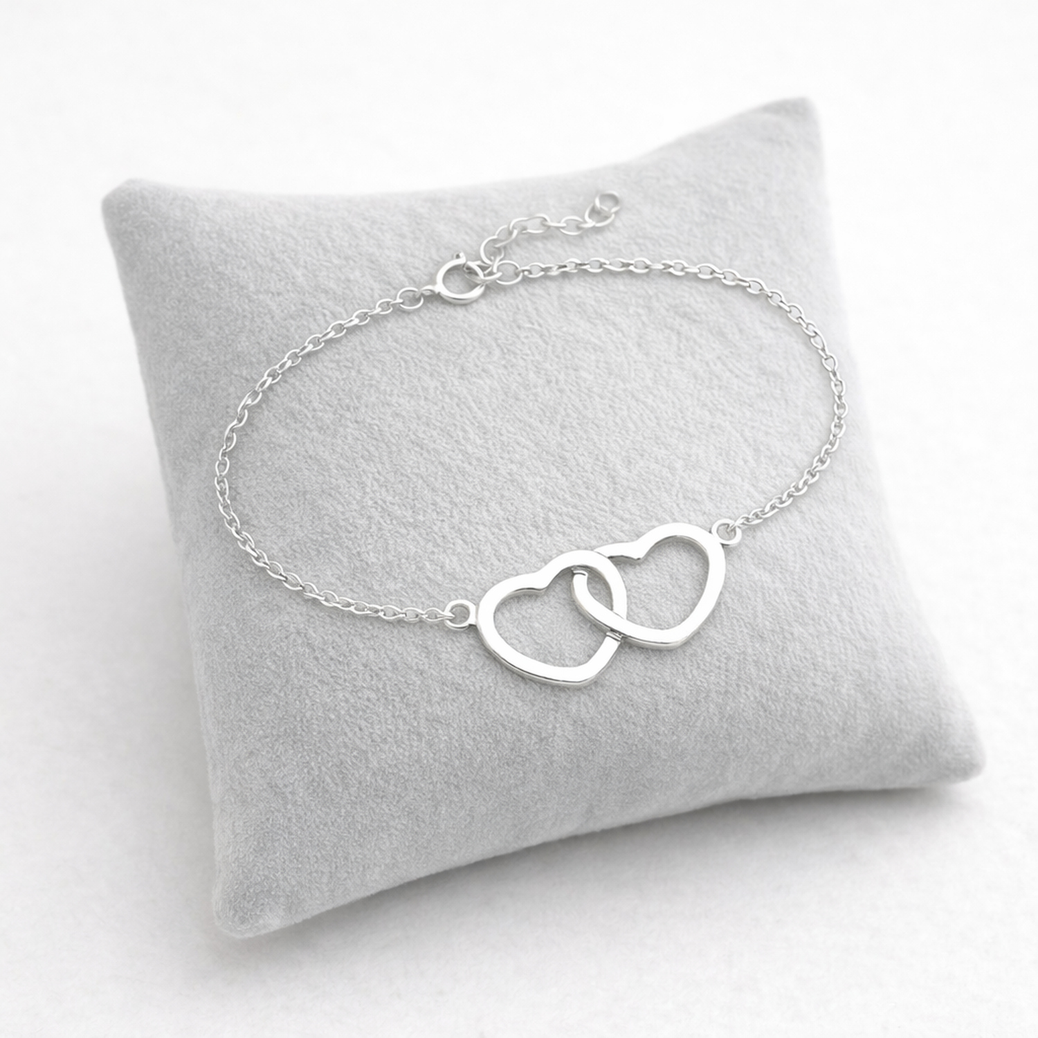 Melchior Jewellery sterling silver double heart bracelet on grey cushion display
