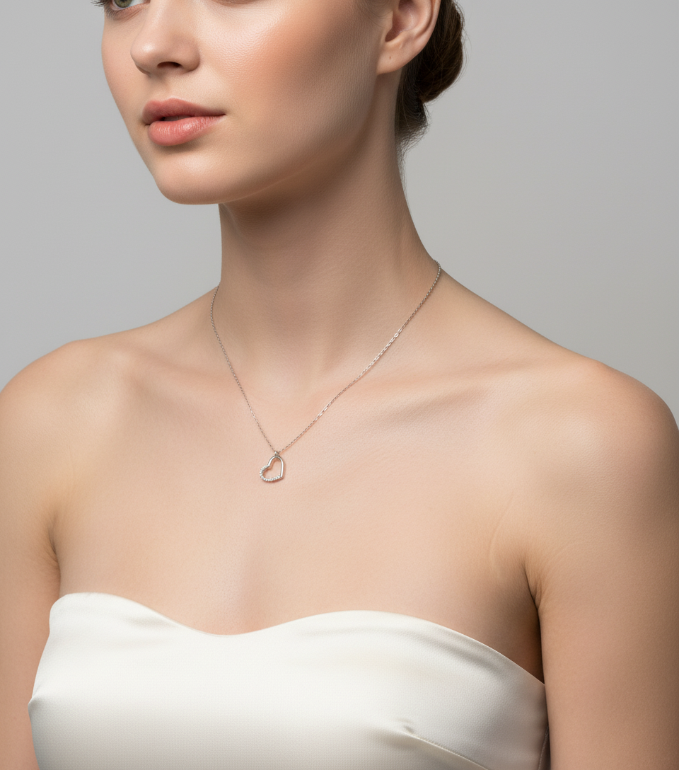 Melchior Jewellery sterling silver heart necklace for women worn with a strapless white top