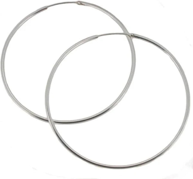 Melchior Jewellery large polished sterling silver hoop earrings simple thin classic hoops for everyday wear