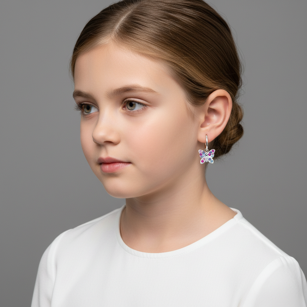 Melchior Jewellery sterling silver kids butterfly earrings worn by young girl with white top