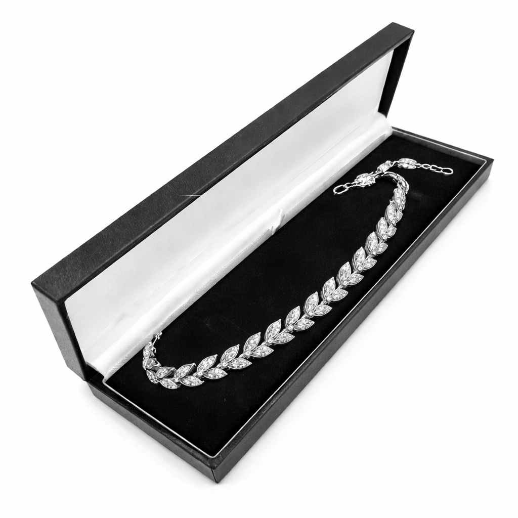 Melchior Jewellery sterling silver leaf bracelet displayed in black and white presentation box