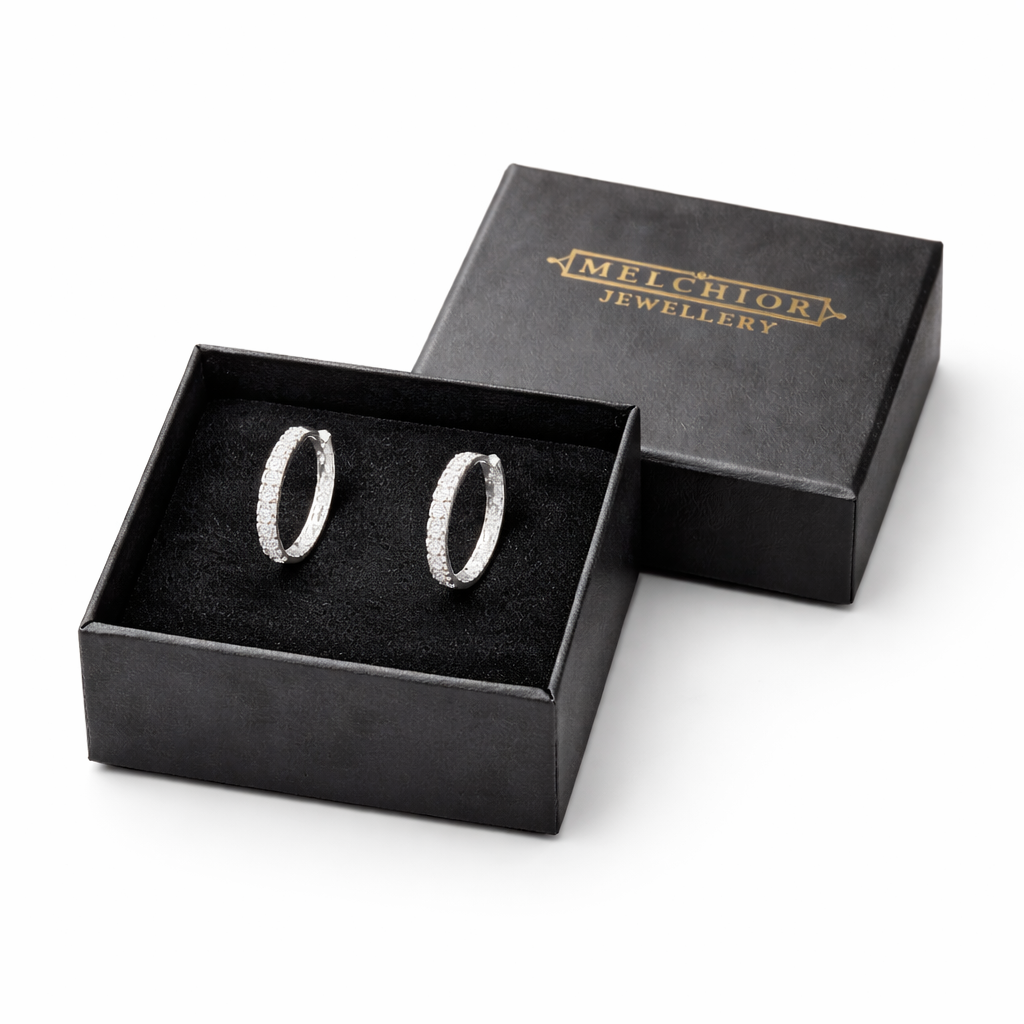 Sterling Silver Luxe Halo Huggies earrings in black Melchior Jewellery box for women