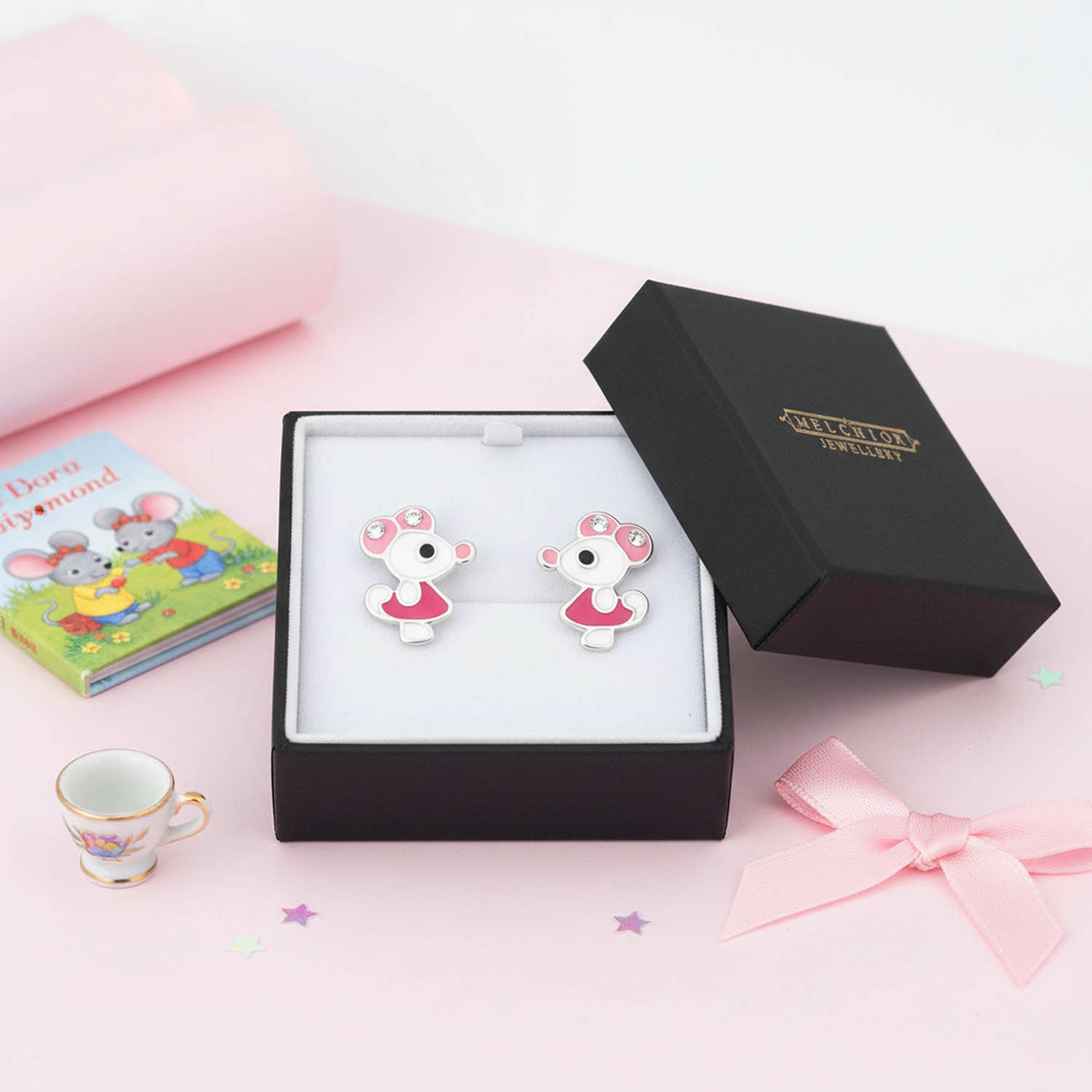 Sterling silver mouse studs for girls by Melchior Jewellery in black gift box on pink background