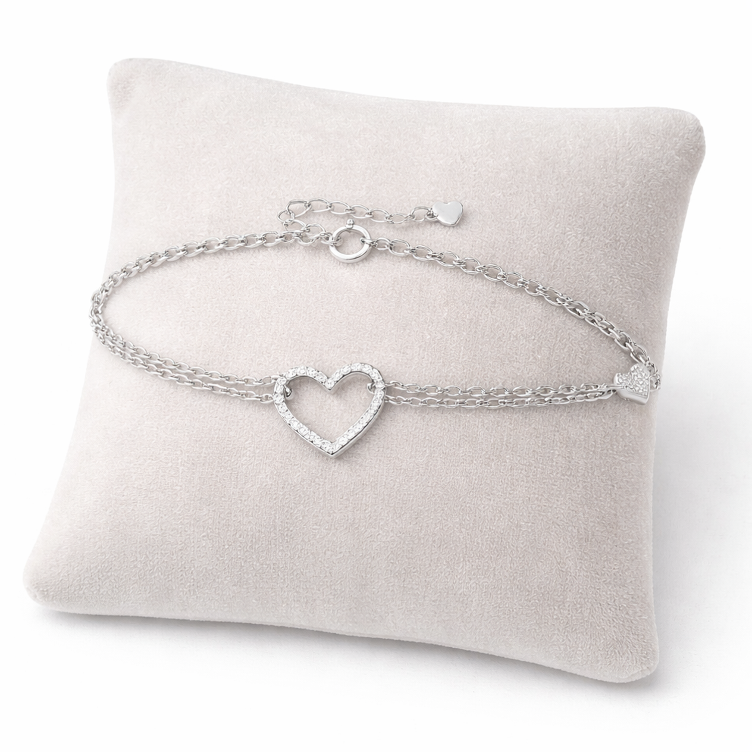 Melchior Jewellery sterling silver open heart bracelet with delicate chain on soft cushion