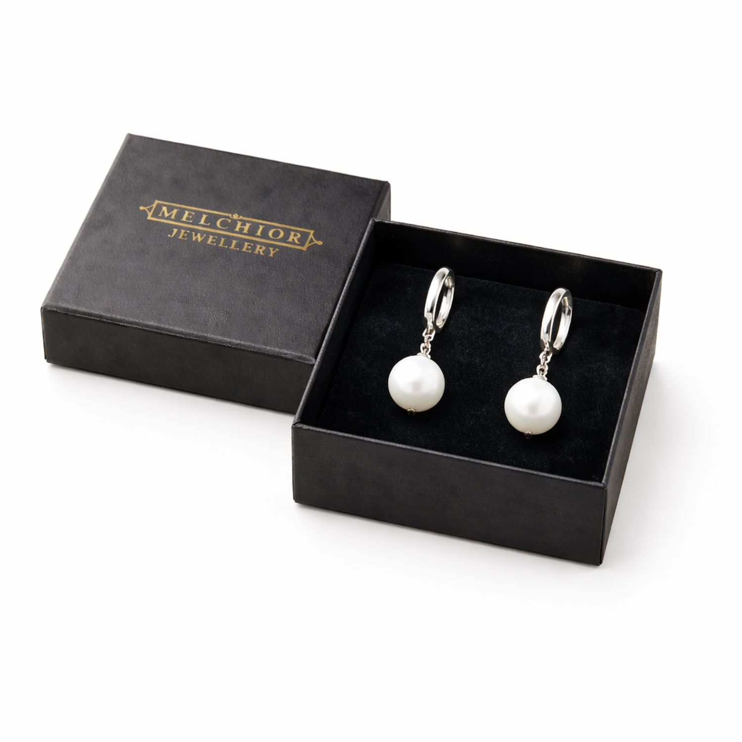 Melchior Jewellery sterling silver pearl drop earrings displayed in a black branded jewellery box